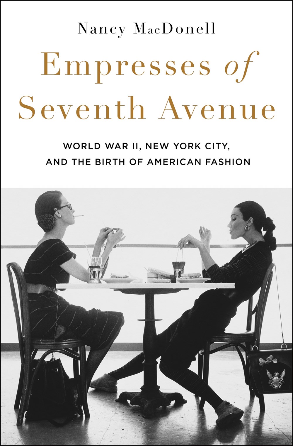 ‘Empresses of Seventh Avenue: World War II, New York City, and the Birth of American Fashion’  by Nancy MacDonell | LJ Review of the Day